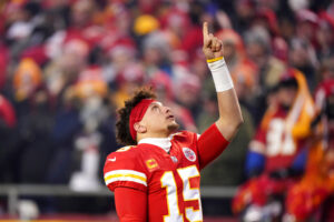 Media by Associated Press - FILE - Kansas City Chiefs quarterback Patrick Mahomes reacts before the NFL AFC Championship playoff football game against the Cincinnati Bengals, Sunday, Jan. 29, 2023, in Kansas City, Mo. Public display of faith is nothing new in football or sports.(AP Photo/Charlie Riedel, File)